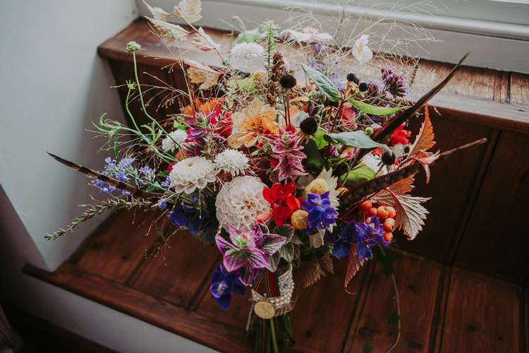 Bouquet Fowers Bride Bridal Feather Dahlias Wild Naturual Orange Red Autumn Weekend Extravaganza Tipi Wedding http://bloomweddings.co.uk/
