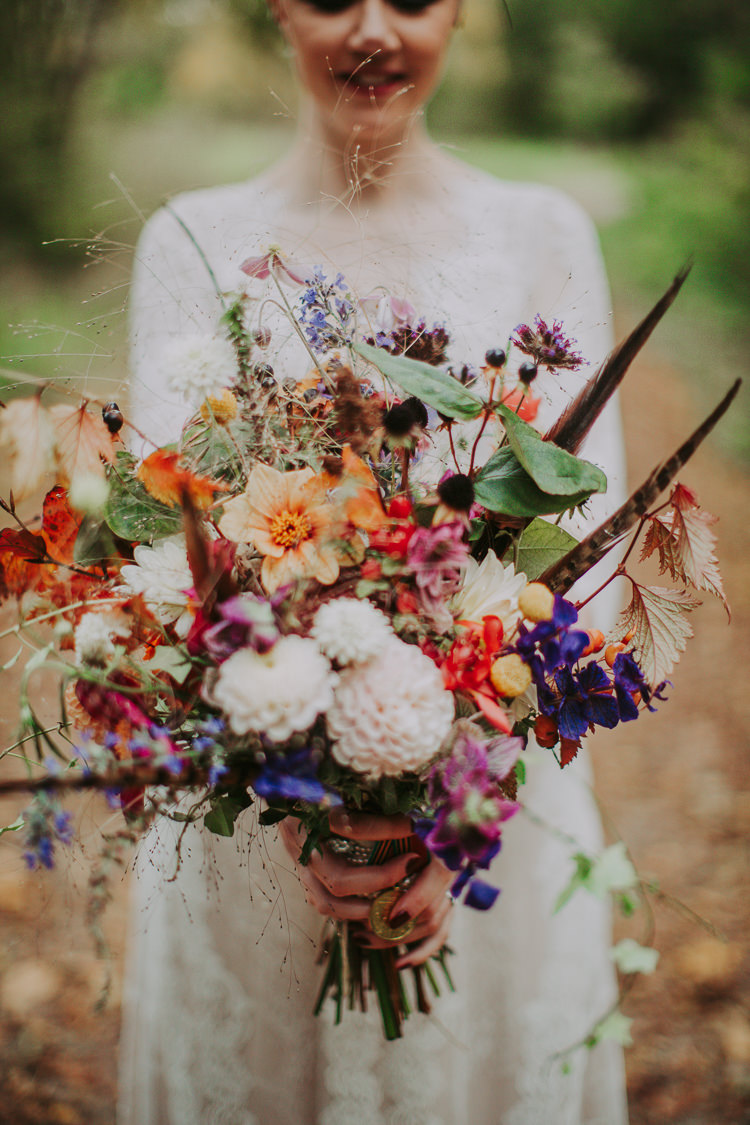Bouquet Fowers Bride Bridal Feather Dahlias Wild Naturual Orange Red Autumn Weekend Extravaganza Tipi Wedding http://bloomweddings.co.uk/