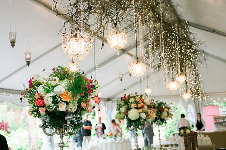 Reception Large Multicoloured Floral Centrepieces Silver Candlesticks Hanging Décor Branches Chandeliers Fairy Lights Flower Farm Outdoor Wedding Minnesota http://eileenkphoto.com/