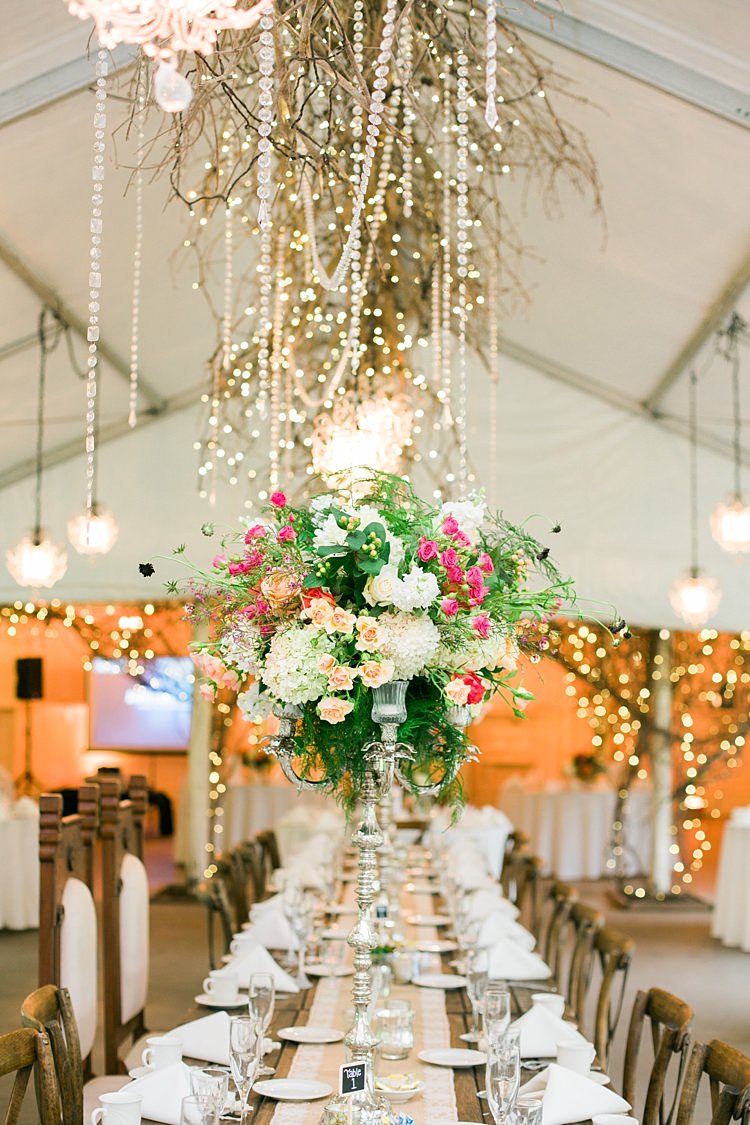 Reception Large Multicoloured Floral Centrepieces Silver Candlesticks Hanging Décor Branches Chandeliers Beads Fairy Lights Flower Farm Outdoor Wedding Minnesota http://eileenkphoto.com/