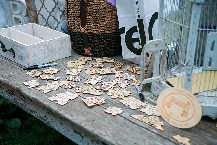 Reception Guest Book Puzzle Pieces Vintage Bird Cage Flower Farm Outdoor Wedding Minnesota http://eileenkphoto.com/