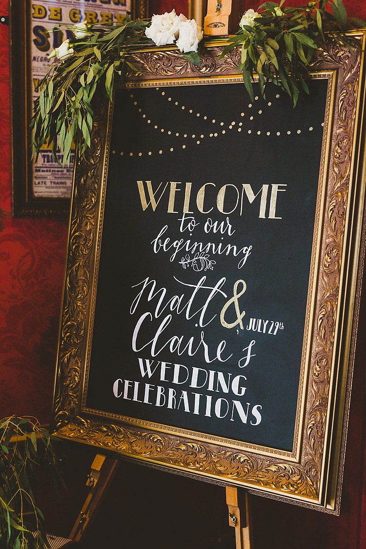 Welcome Sign Chalk Black Board Gold Flowers Foliage Glamorous Gatsby City Hall Wedding http://www.emmakenny.com/ 