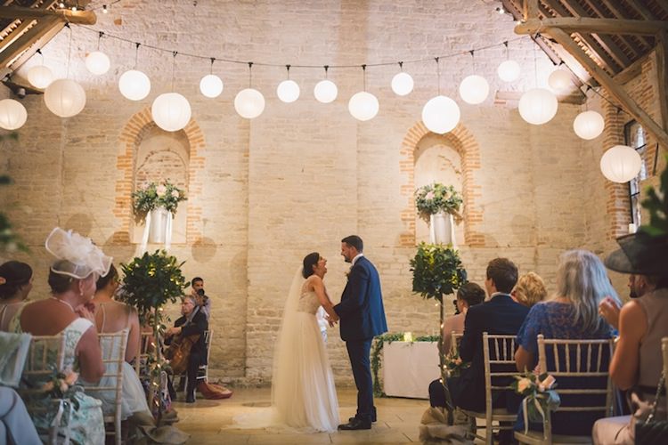 Lanterns Ceremony Hanging Backdrop Light Pretty Summer Barn Wedding http://www.koweddings.com/