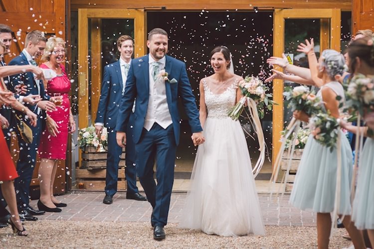 Confetti Throw Light Pretty Summer Barn Wedding http://www.koweddings.com/