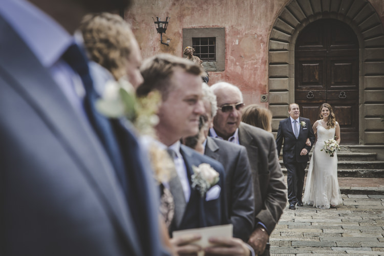 Outdoor Ceremony Bride Lace Tulle Stella York Bridal Gown Loose Curls Hairstyle Bouquet White Cream Pink Roses Father Groom Groomsmen Historic Pink Villa Romantic Intimate Tuscany Destination Wedding http://angelicabraccini.com/