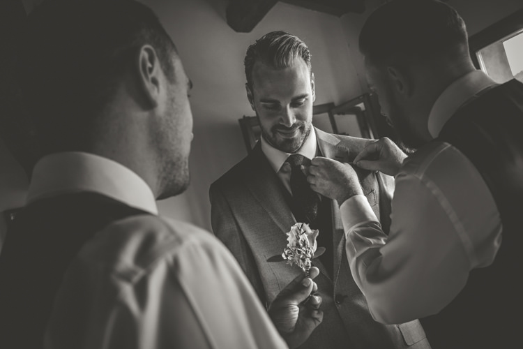 Groom Groomsmen Ceremony Preparations Rose Buttonhole Romantic Intimate Tuscany Destination Wedding http://angelicabraccini.com/