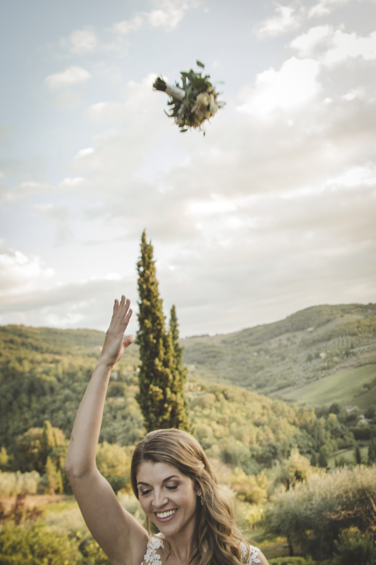 Bride Lace Tulle Stella York Bridal Gown Bouquet Toss Romantic Intimate Tuscany Destination Wedding http://angelicabraccini.com/