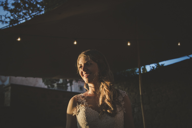 Bride Lace Tulle Stella York Bridal Gown Loose Curls Hairstyle Sunset Romantic Intimate Tuscany Destination Wedding http://angelicabraccini.com/