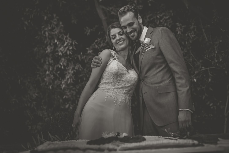 Reception Bride Lace Tulle Stella York Bridal Gown Groom Light Blue Suit Textured Blue Tie Rose Buttonhole Romantic Intimate Tuscany Destination Wedding http://angelicabraccini.com/