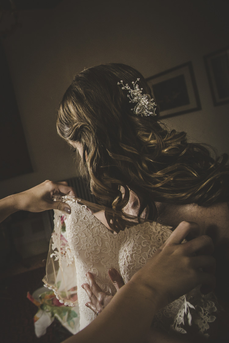 Bride Lace Tulle Stella York Bridal Gown Loose Curls Hairstyle Crystal Hairpiece Romantic Intimate Tuscany Destination Wedding http://angelicabraccini.com/