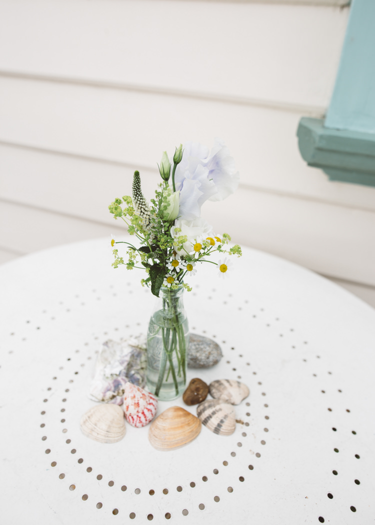 Bottle Flowers Shells Decor Low Key Pastel Seaside Wedding http://holliecarlinphotography.com/