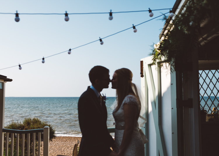 Low Key Pastel Seaside Wedding http://holliecarlinphotography.com/