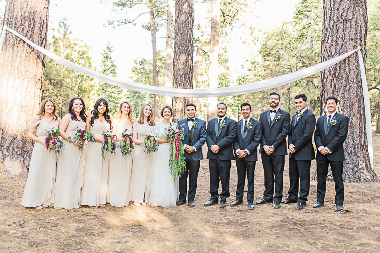 Bridal Party Bride Watters Separates Lace Top Tulle Skirt Cascading Multicoloured Bouquet Bridesmaids Ivory Dresses Groom Dark Blue Jacket Black Satin Lapel Black Pants Black Bowtie Groomsmen Black Suits Black Bowties Ties Ceremony Location Hanging Soft Fabric Trees DIY Whimsical Camp Wedding California http://www.landbphotography.org/