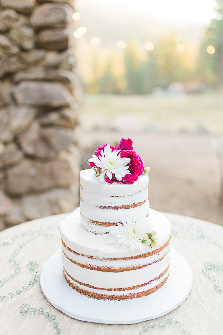Outdoor Reception Naked Wedding Cake Pink White Fresh Flowers Hanging Fairy Lights DIY Whimsical Camp Wedding California http://www.landbphotography.org/