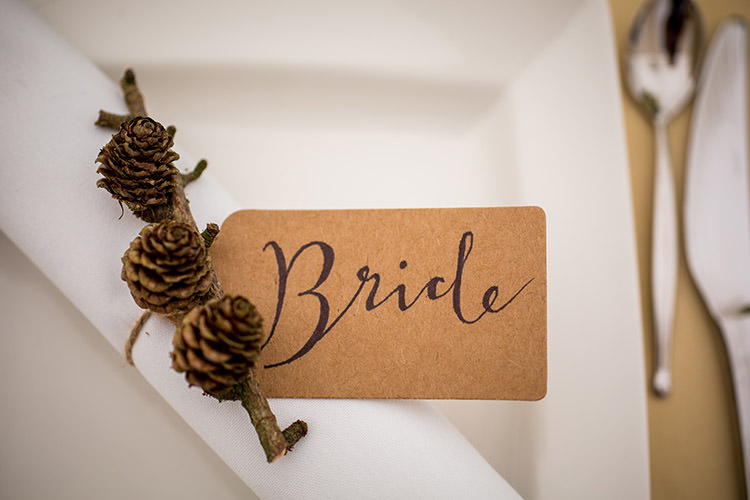 Luggage Tag Calligraphy Pine Cone Twig Place Name Setting Whimsical Greenery Nature Wedding http://lunaweddings.co.uk/
