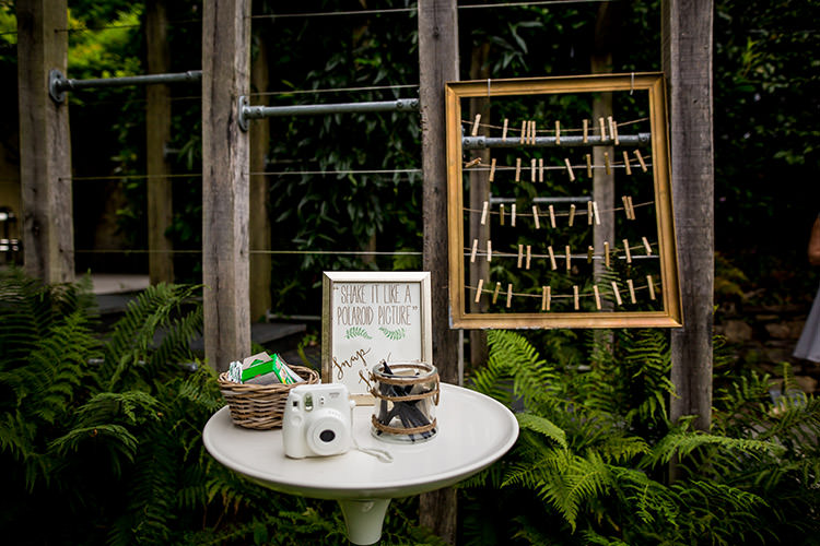 Guest Book Polariod Pegs Frame Camera Whimsical Greenery Nature Wedding http://lunaweddings.co.uk/