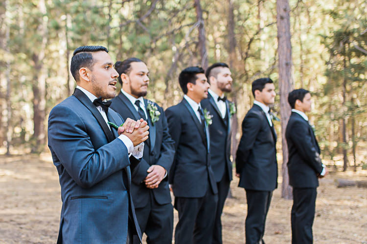 Outdoor Ceremony Groom Dark Blue Jacket Black Satin Lapel Black Bowtie Groomsmen Black Suits Black Bowties Ties DIY Whimsical Camp Wedding California http://www.landbphotography.org/