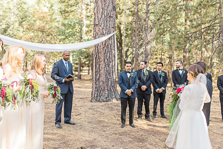 Outdoor Ceremony Bride Watters Separates Lace Top Tulle Skirt Veil Cascading Multicoloured Bouquet Father Groom Dark Blue Jacket Black Satin Lapel Black Pants Bowtie Groomsmen Black Suits Bridesmaids Ivory Dresses Celebrant DIY Whimsical Camp Wedding California http://www.landbphotography.org/