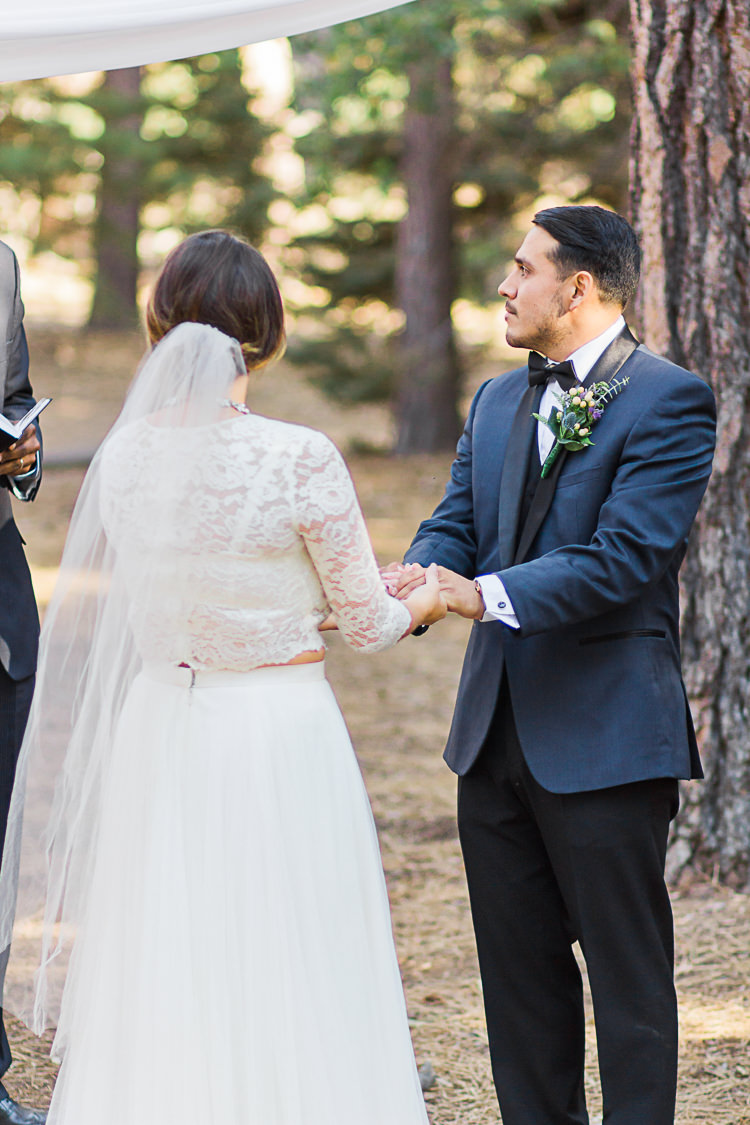 Outdoor Ceremony Bride Watters Separates Lace Top Tulle Skirt Veil Groom Dark Blue Jacket Black Satin Lapel Black Vest Pants Bowtie Floral Buttonhole DIY Whimsical Camp Wedding California http://www.landbphotography.org/