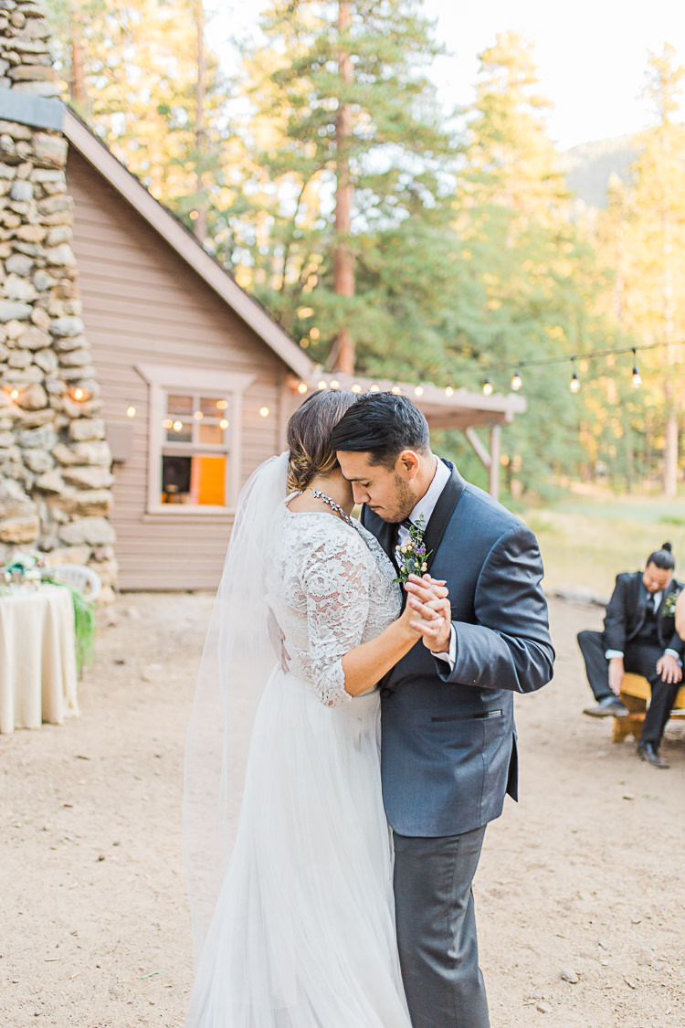 Outdoor Reception Bride Watters Separates Lace Top Tulle Skirt Veil Groom Dark Blue Jacket Black Pants Dancing Guests Hanging Fairy Lights DIY Whimsical Camp Wedding California http://www.landbphotography.org/