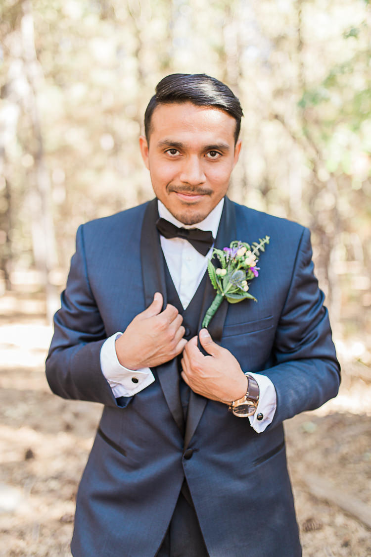 Groom Dark Blue Jacket Black Satin Lapel Black Vest Black Pants Black Bowtie Floral Buttonhole DIY Whimsical Camp Wedding California http://www.landbphotography.org/