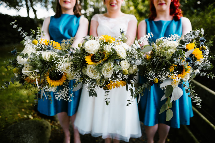 Bouquets Bride Bridal Bridesmaids Sunflowers Thistle Rose Alternative Lego Aviation Wedding http://www.honeyandthemoonphotography.co.uk/