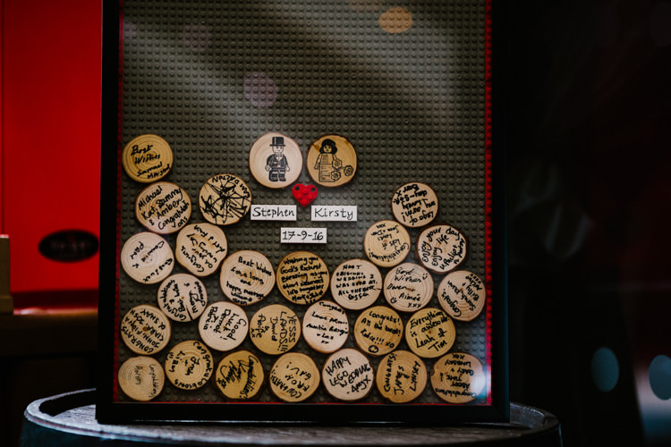 Guest Book Log Slice Frame Alternative Lego Aviation Wedding http://www.honeyandthemoonphotography.co.uk/