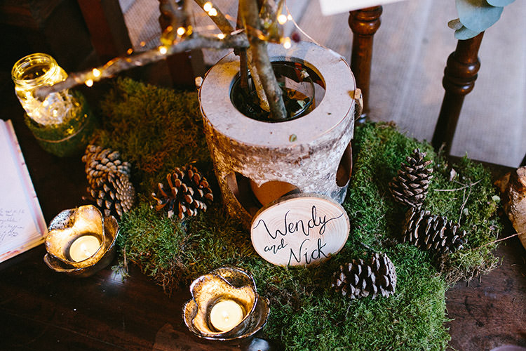 Moss Candles Pine Cones Decor Wooden Sign Enchanted Fairy Garden Wedding http://lunaweddings.co.uk/