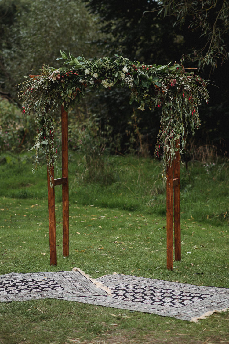 Wooden Arch Arbour Flowers Greenery Foliage Ceremony Backdrop Bohemian Festival Tipi Wedding http://esmemai.com/