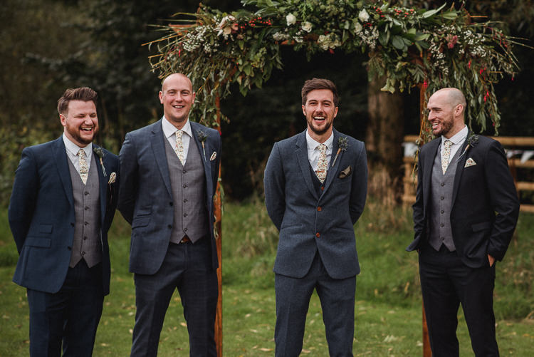 Groom Groomsmen Navy Suite Floral Tie Waistcoats Bohemian Festival Tipi Wedding http://esmemai.com/