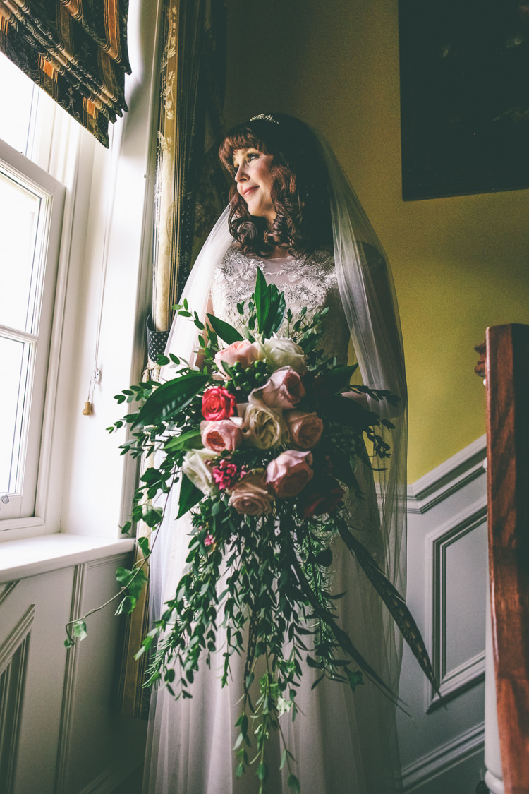 Pink Red Rose Bouquet Greenery Foliage Large Feathers Cascading Bride Bridal Rustic Woodland Birds Outdoorsy Wedding http://www.emmaboileau.co.uk/