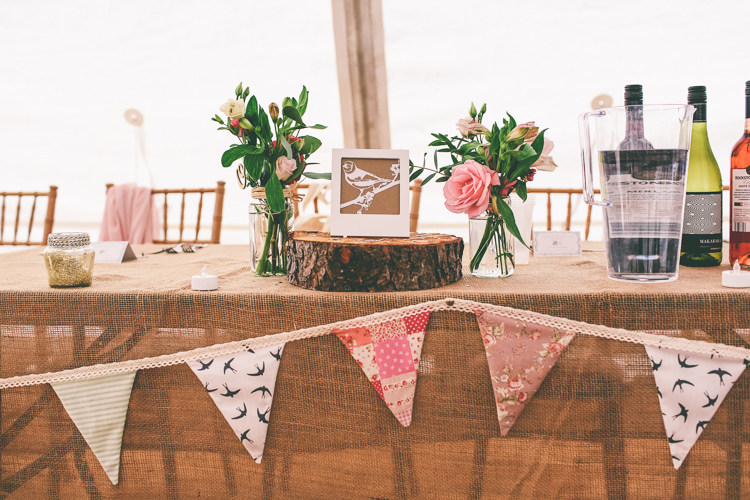 Hessian Burlap Bunting Flowers Log Decor Rustic Woodland Birds Outdoorsy Wedding http://www.emmaboileau.co.uk/