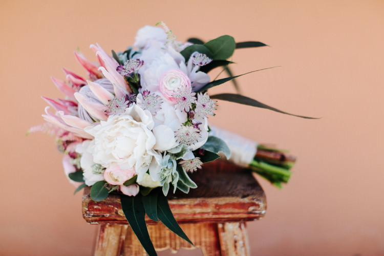 Bride Bouquet White Pink Peonies Protea Eucalyptus Cream Ribbon Beautiful Pink Blue Tuscany Villa Wedding http://www.chloemurdochphotography.com/