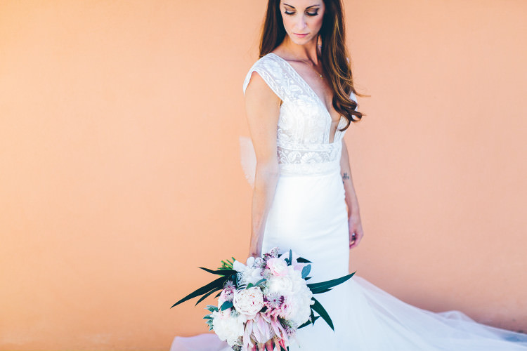 Bride Lace Mermaid Two Piece Bridal Gown Bouquet Pink White Peonies Protea Eucalyptus Beautiful Pink Blue Tuscany Villa Wedding http://www.chloemurdochphotography.com/