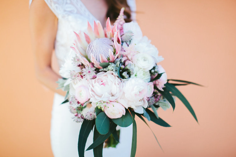 Bride Lace Two Piece Bridal Gown Bouquet Pink White Peonies Protea Eucalyptus Florals Beautiful Pink Blue Tuscany Villa Wedding http://www.chloemurdochphotography.com/