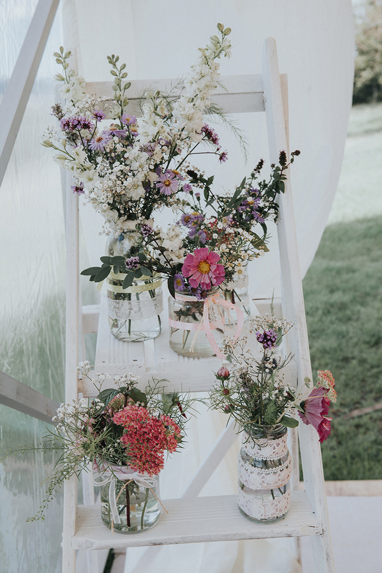 Ladder Flowers Jars Lace Ribbon Decor Beautiful Flowery Country Marquee Wedding http://www.maddiefarrisphotography.co.uk/