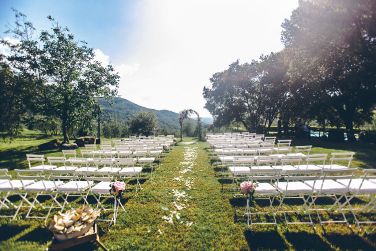 Outdoor Ceremony White Chairs Floral Arch Pink Flowers Beautiful Pink Blue Tuscany Villa Wedding http://www.chloemurdochphotography.com/