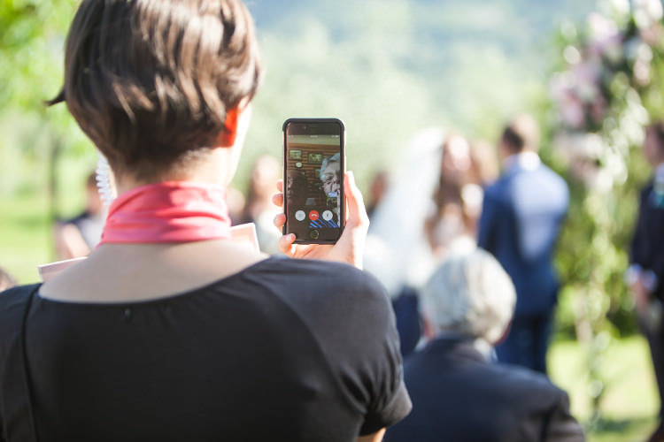 Outdoor Ceremony Parent Video Call Bride Groom Guests Beautiful Pink Blue Tuscany Villa Wedding http://www.chloemurdochphotography.com/