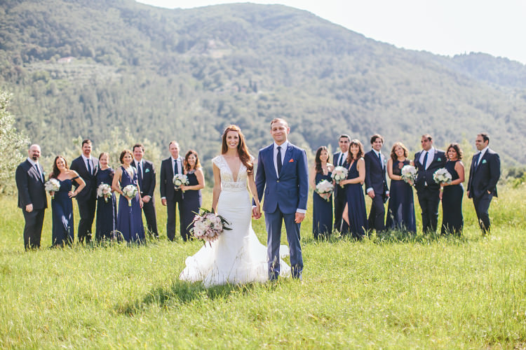 Bridal Party Bride Lace Mermaid Two Piece Bridal Gown White Pink Floral Bouquet Groom Royal Blue Suit White Shirt Dark Blue Tie Orange Pocket Square Bridesmaids Dark Blue Dresses Groomsmen Dark Blue Suits Beautiful Pink Blue Tuscany Villa Wedding http://www.chloemurdochphotography.com/