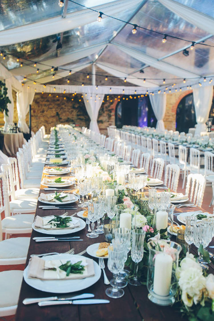 Reception Marquee Hanging Fairy Lights Wooden Table White Chairs Florals Greenery Crystal Candleholders Beautiful Pink Blue Tuscany Villa Wedding http://www.chloemurdochphotography.com/