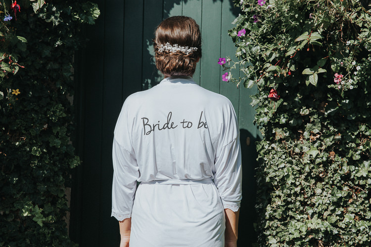 Bride Dressing Gown Beautiful Flowery Country Marquee Wedding http://www.maddiefarrisphotography.co.uk/