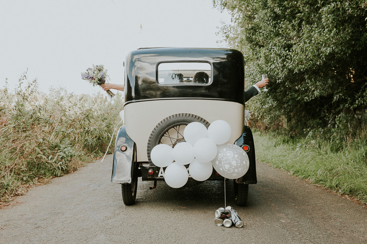 Classic Vintage Car Transport Beautiful Flowery Country Marquee Wedding http://www.maddiefarrisphotography.co.uk/