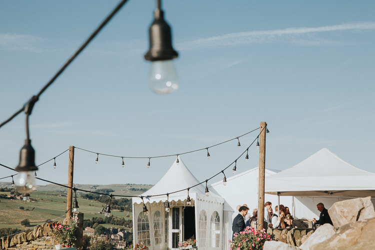 Festoon Lighting Outdoors Beautiful Flowery Country Marquee Wedding http://www.maddiefarrisphotography.co.uk/