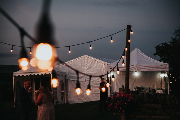 Festoon Lights Beautiful Flowery Country Marquee Wedding http://www.maddiefarrisphotography.co.uk/
