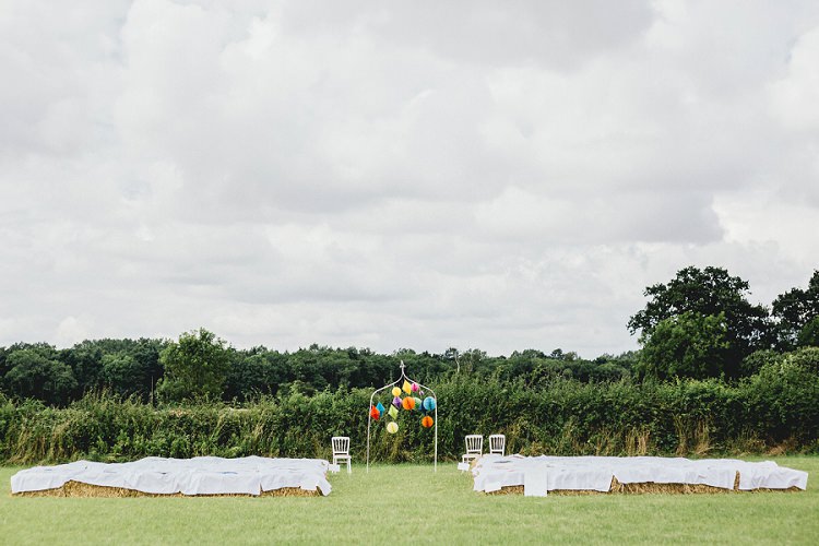 Outdoor Ceremony UK Field Hay Bales All Things Big Bright Beautiful Multicolour Wedding http://benjaminmathers.co.uk/