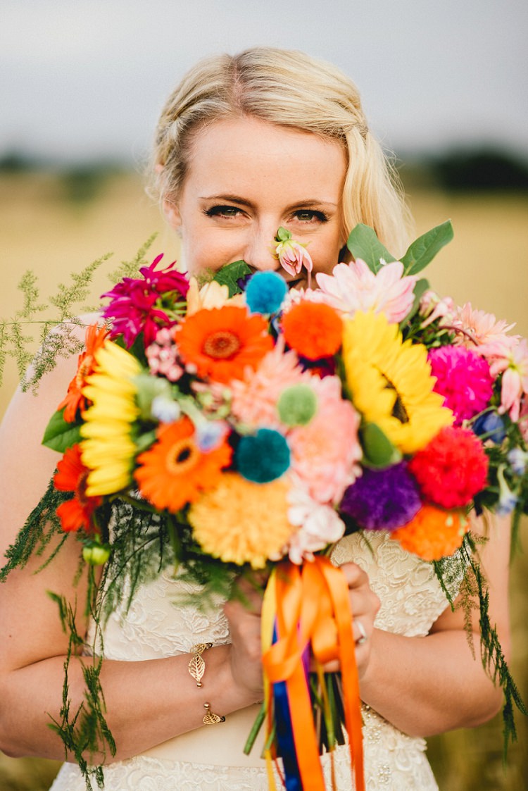 Bouquet Flowers Rainbow Pom Poms Ribbons Bride Bridal Sunflowers Gerbera Dahlia All Things Big Bright Beautiful Multicolour Wedding http://benjaminmathers.co.uk/