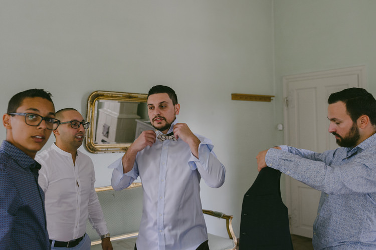 Groom Light Blue Shirt Patterned Bowtie Ceremony Preparations Natural Greenery Stylish Wedding Transylvania https://raresion.com/