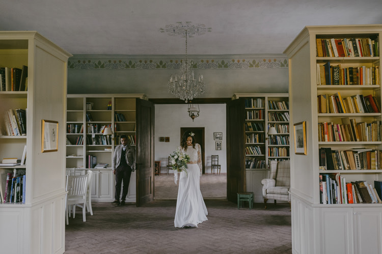 Bride Two Piece Lace Bridal Gown Floral Hairpiece Bouquet White Florals Greenery White Ribbon Groom Light Blue Shirt Sand Jacket Dark Grey Vest Brown Pants Patterned Bowtie Natural Greenery Stylish Wedding Transylvania https://raresion.com/