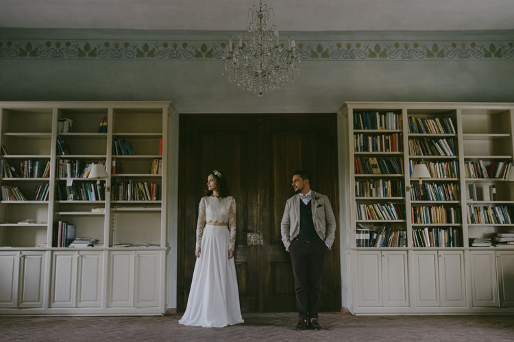 Bride Two Piece Lace Bridal Gown Floral Hairpiece Groom Light Blue Shirt Sand Jacket Dark Grey Vest Brown Pants Patterned Bowtie Natural Greenery Stylish Wedding Transylvania https://raresion.com/