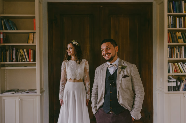 Bride Two Piece Lace Bridal Gown Floral Hairpiece Groom Light Blue Shirt Sand Jacket Dark Grey Vest Brown Pants Patterned Bowtie Floral Buttonhole Natural Greenery Stylish Wedding Transylvania https://raresion.com/